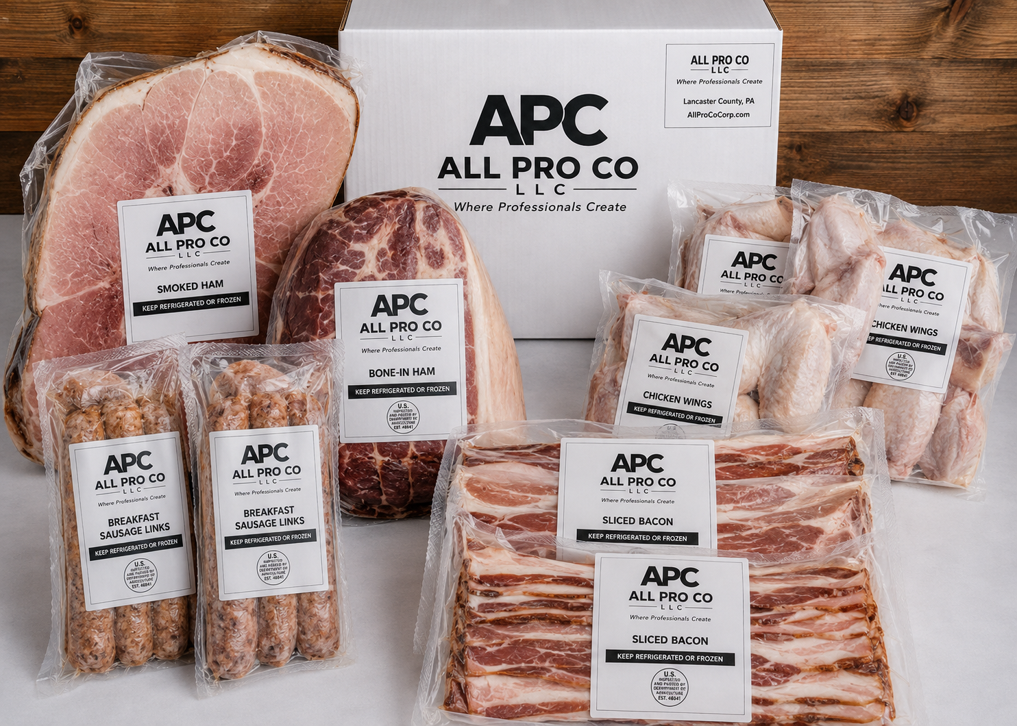 All Pro Co Pro Pork Box — ham steak, pork shoulder Boston butt, bacon, breakfast sausage, and maple sausage, individually vacuum-sealed and labeled